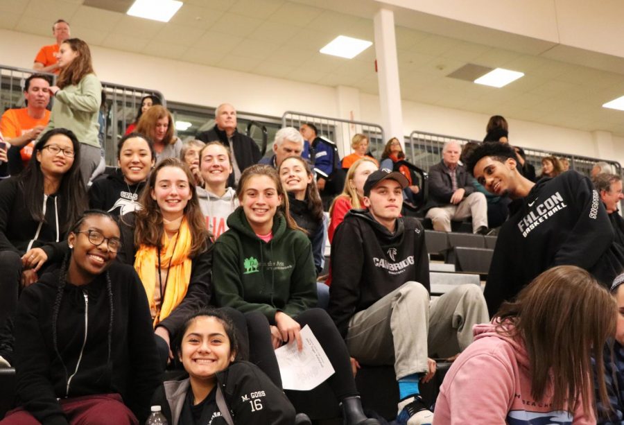Pictured: Fans at an away girls volleyball game this past fall.