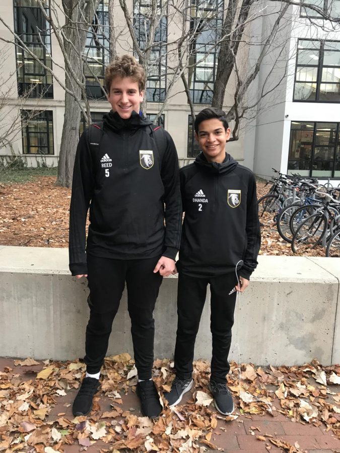 Freshman+boys+soccer+team+captain+Krish+Dhanda+and+player+Charlie%0AReed+wear+the+newly+earned+team+warm+up+jackets.
