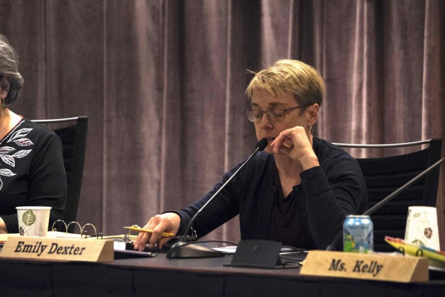 Pictured: School Committee member Emily Dexter, recusing herself from voting on passing the investigation.