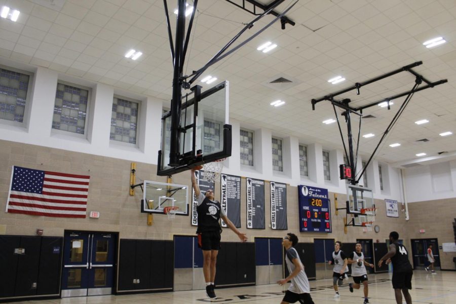 Pictured: CRLS Boys Varsity Basketball team hard at work during practice.