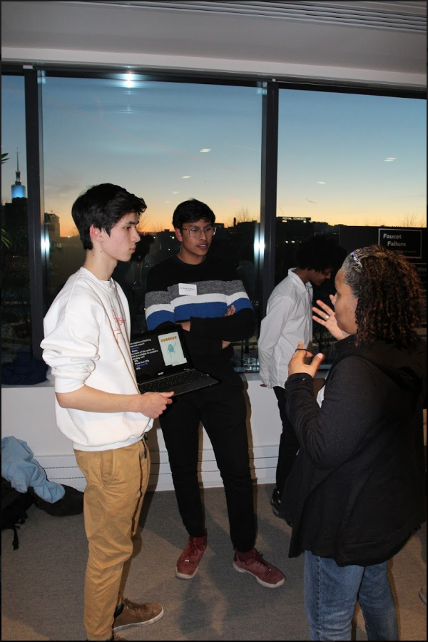 Pictured: Glocal students discussing their projects at the final event.