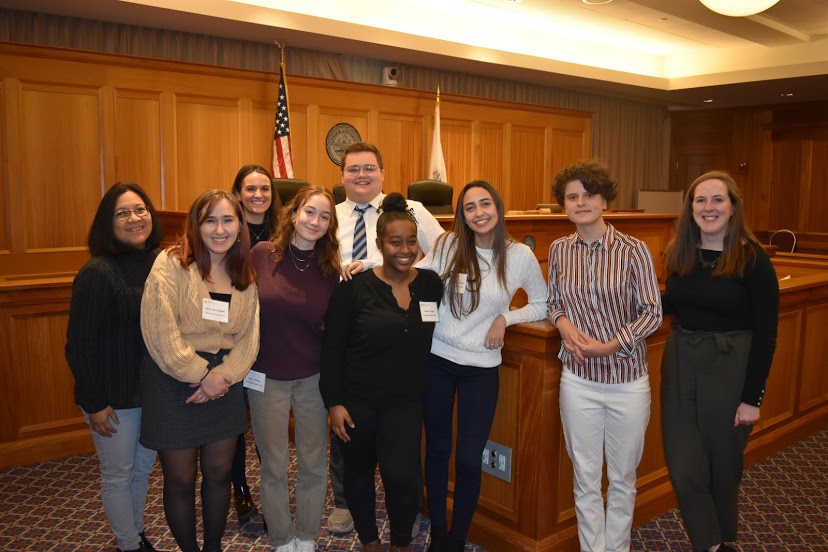 Pictured: Ms. Cesario and the group of CRLS students who attended the competition at Suffolk Law School. 