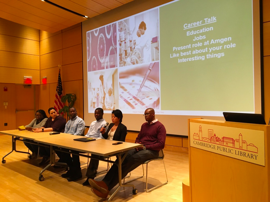Pictured: Amgen panelists speaking at the Cambridge Public Librarys main branch. 