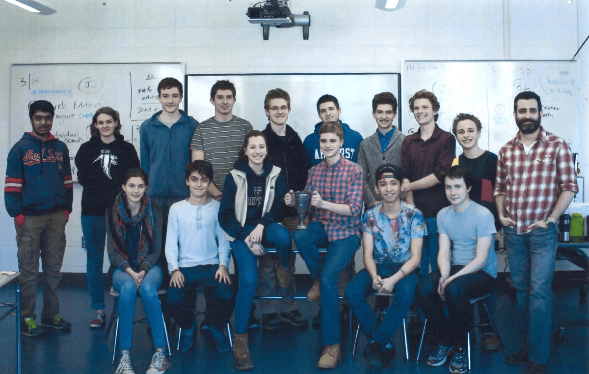 Mr. Matteo (on the right) and the Register Forum’s staff in the late 2010s.